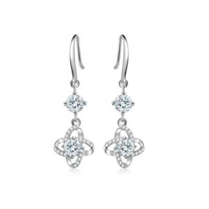 Four-leaf clover sterling silver drop earrings with white cubic zirconia stone on white background