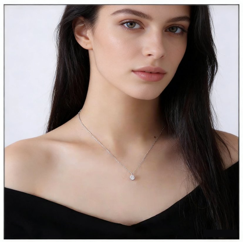 Model wearing Symara lab grown diamond necklace on 45cm chain in platinum finish, featuring brilliant round cut solitaire pendant at collarbone length.