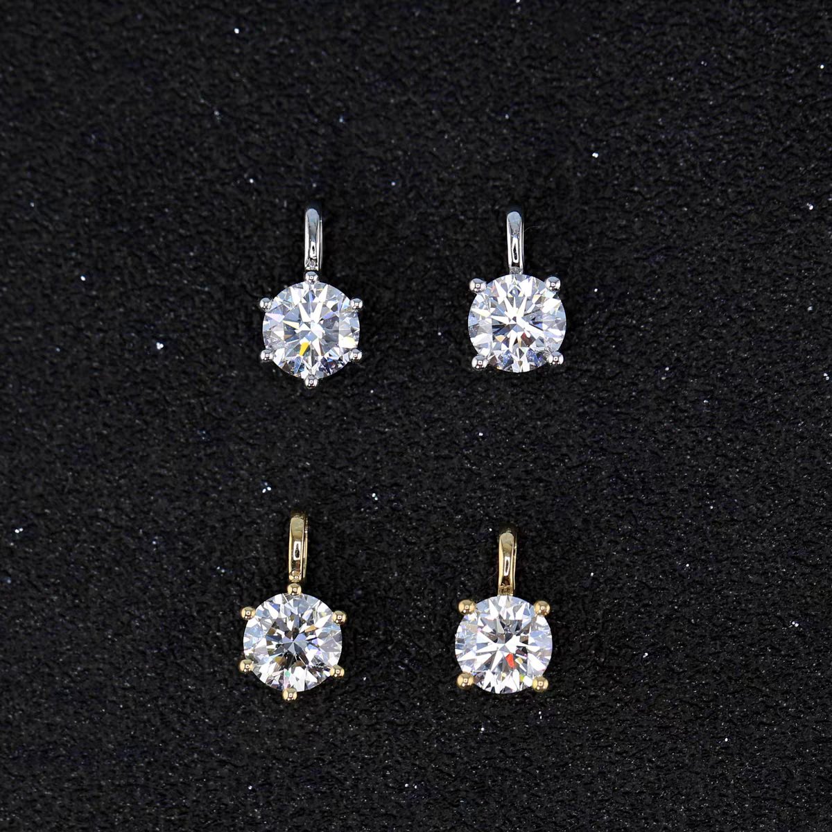 Symara solitaire necklace displayed in jewelry box, 0.8 carat round cut lab grown diamond in classic pendant setting with chain neatly arranged.