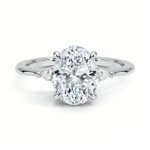 Tuso three stone engagement ring side profile low setting
