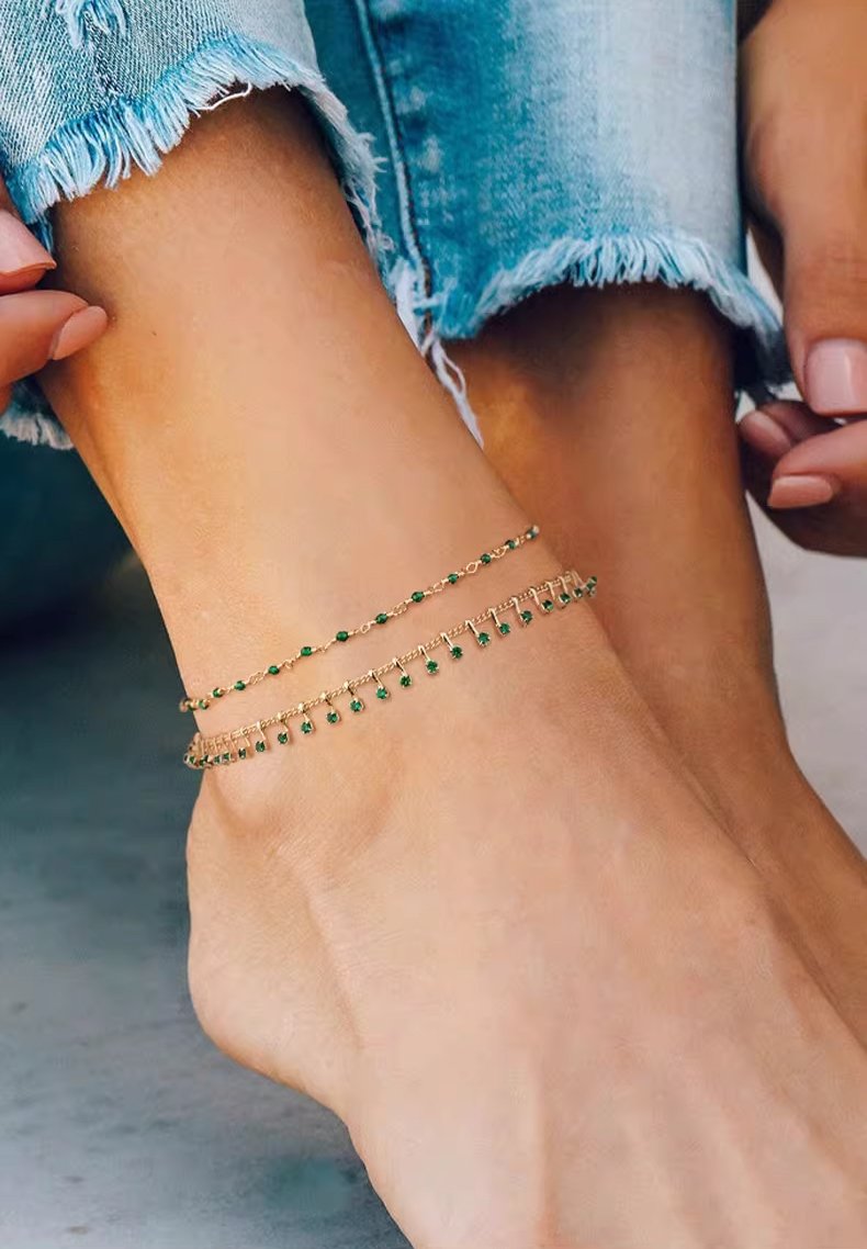minimalist-gold-anklet-gift-for-friends-model-image Woman Wearing 14K Gold Plated Dainty Anklet Everyday Summer Style