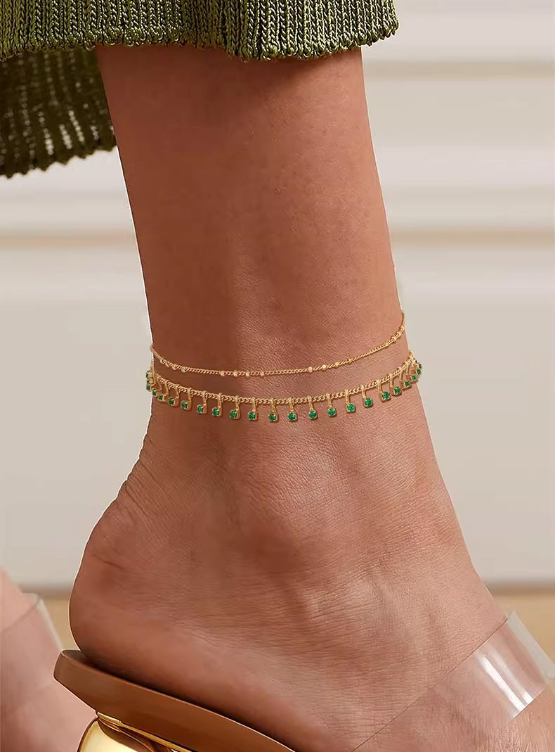 women-wearing-gold-anklet-summer-style Woman Wearing 14K Gold Plated Dainty Anklet Everyday Summer Style