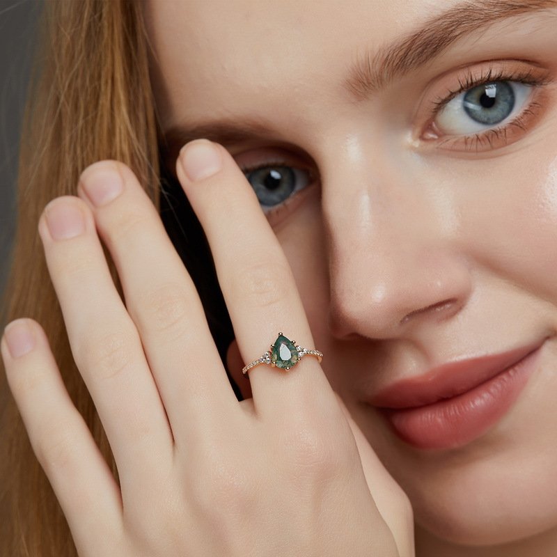 Woman wearing dainty moss agate ring on finger, S925 silver 10K gold-plated, everyday wear jewelry