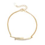 18k gold plated studded bracelet featuring delicate chain and evenly spaced polished studs, solid 925 sterling silver base with warm gold finish, lightweight everyday accessory for women.
