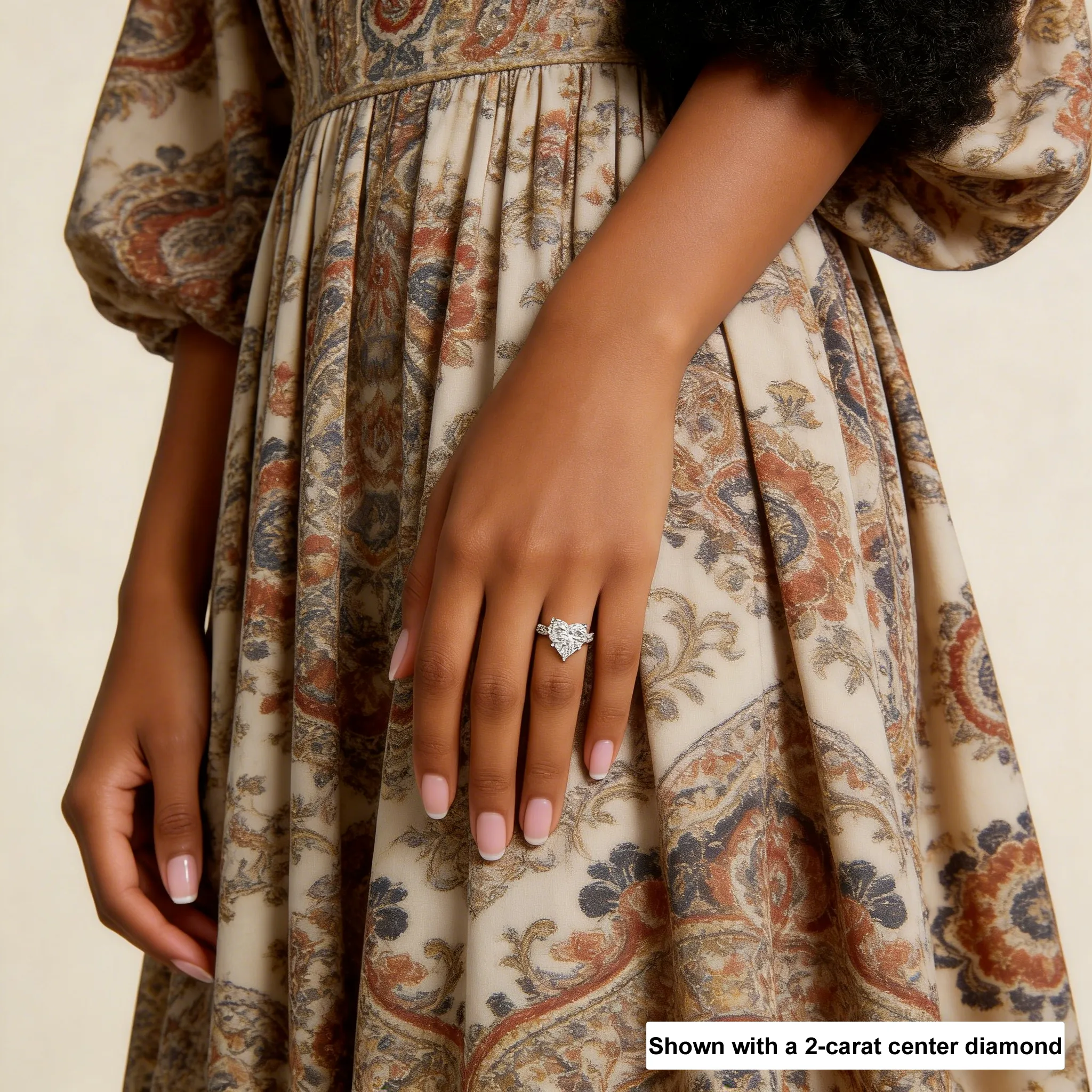 Model showcasing white gold heart diamond ring with twisted vine band