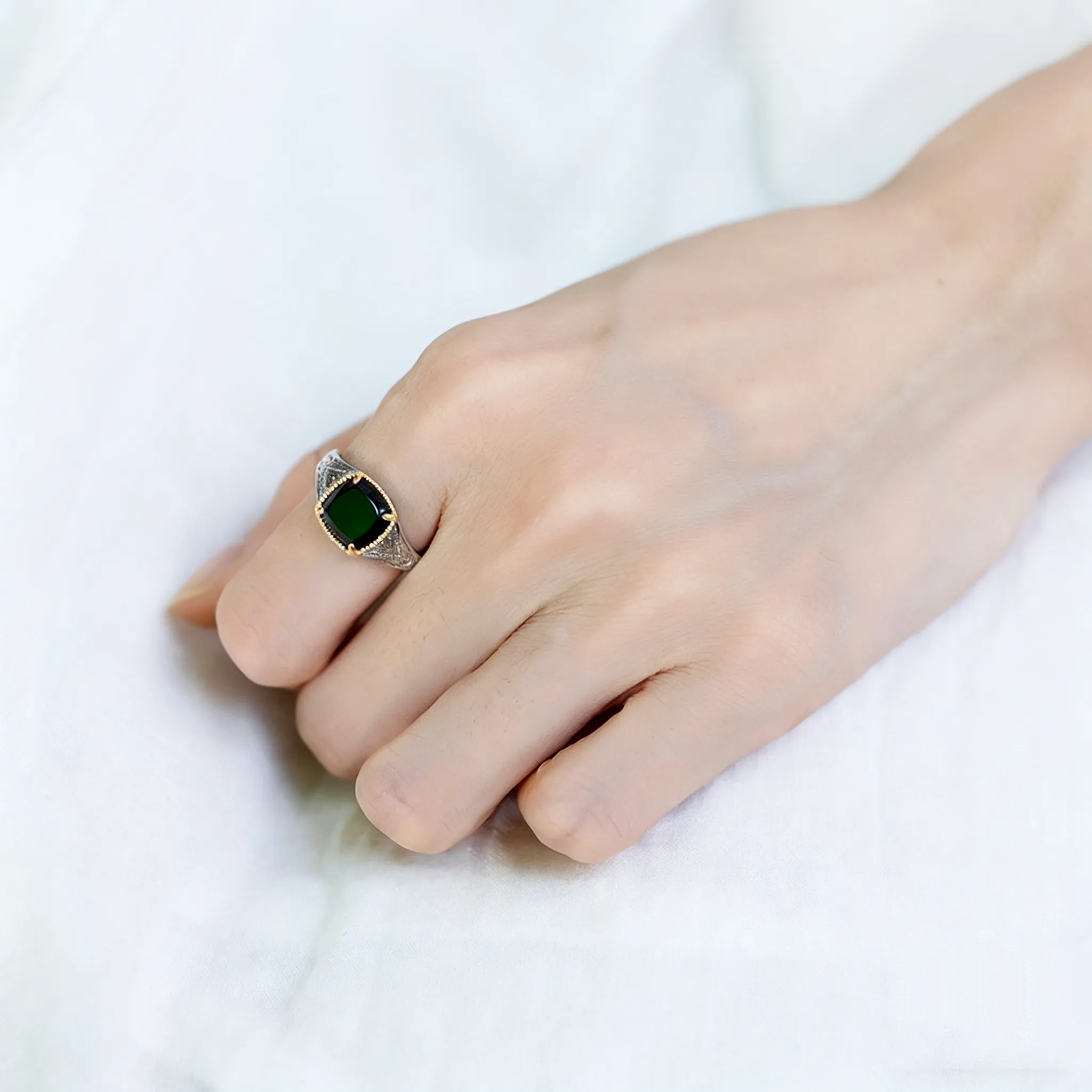 Woman Wearing Vintage Black Onyx Signet Ring On Finger