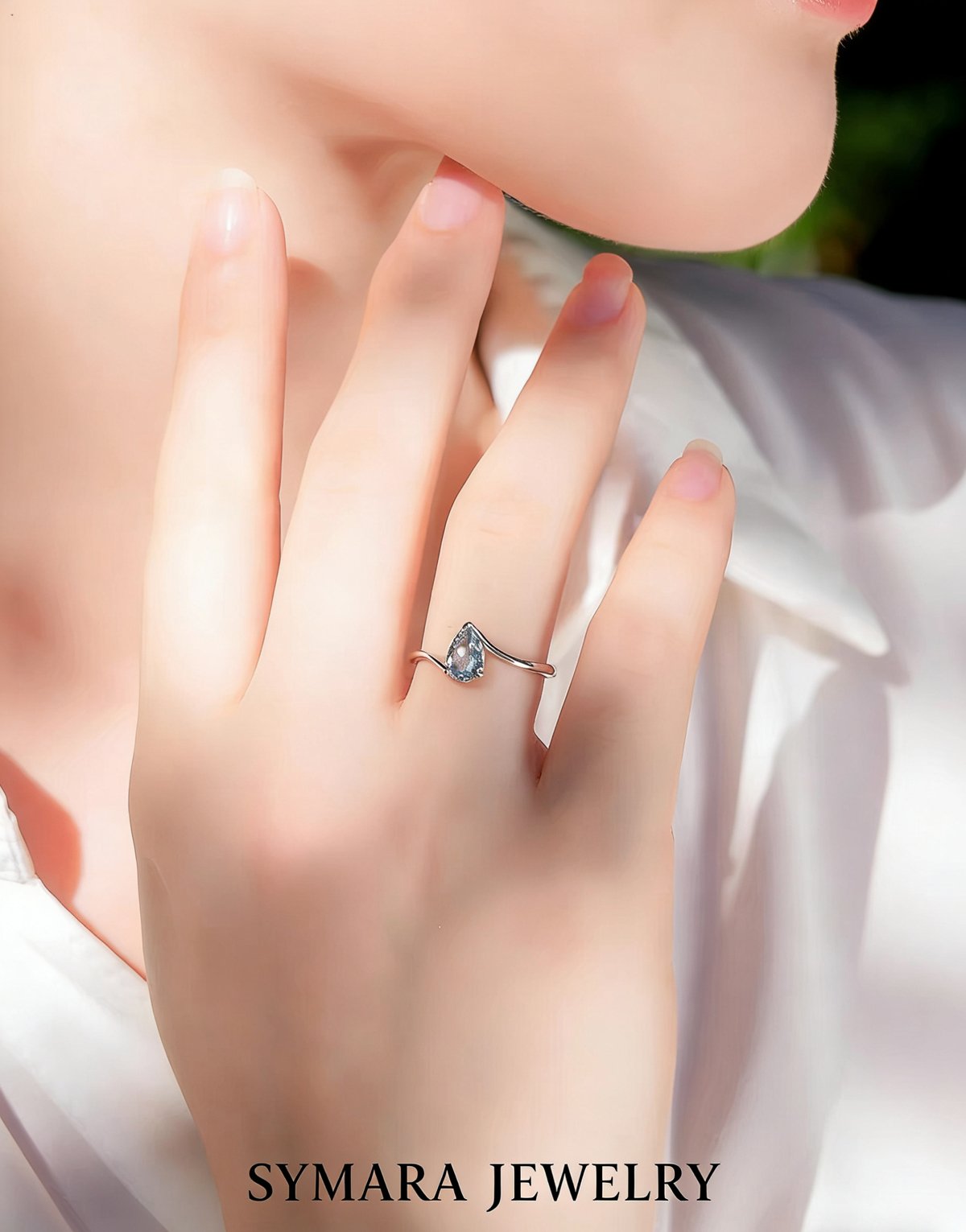 Pear Cut Aquamarine Promise Ring Worn on Finger, Bridal Style