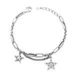 Vintage star 925 sterling silver layered bracelet on neutral background, featuring oxidized finish double chain design with star charms and cubic zirconia accent, handcrafted Thai silver jewelry from SYMARA.