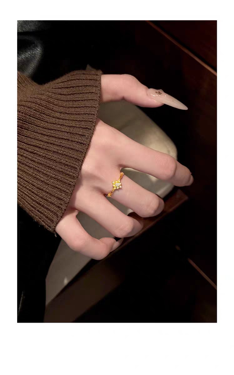 Woman Wearing Sunflower Moissanite Gold Ring