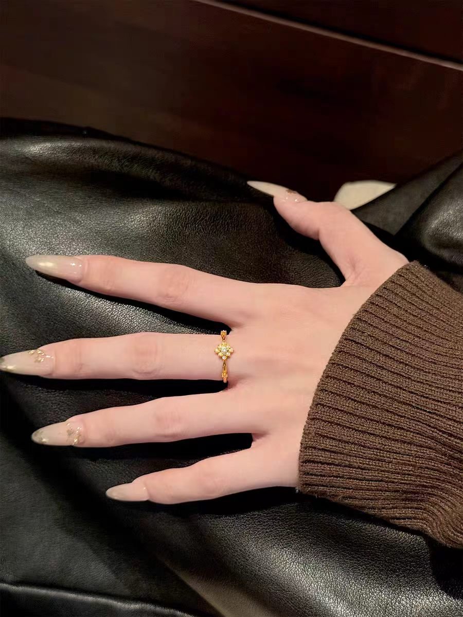 Woman Wearing Sunflower Moissanite Gold Ring