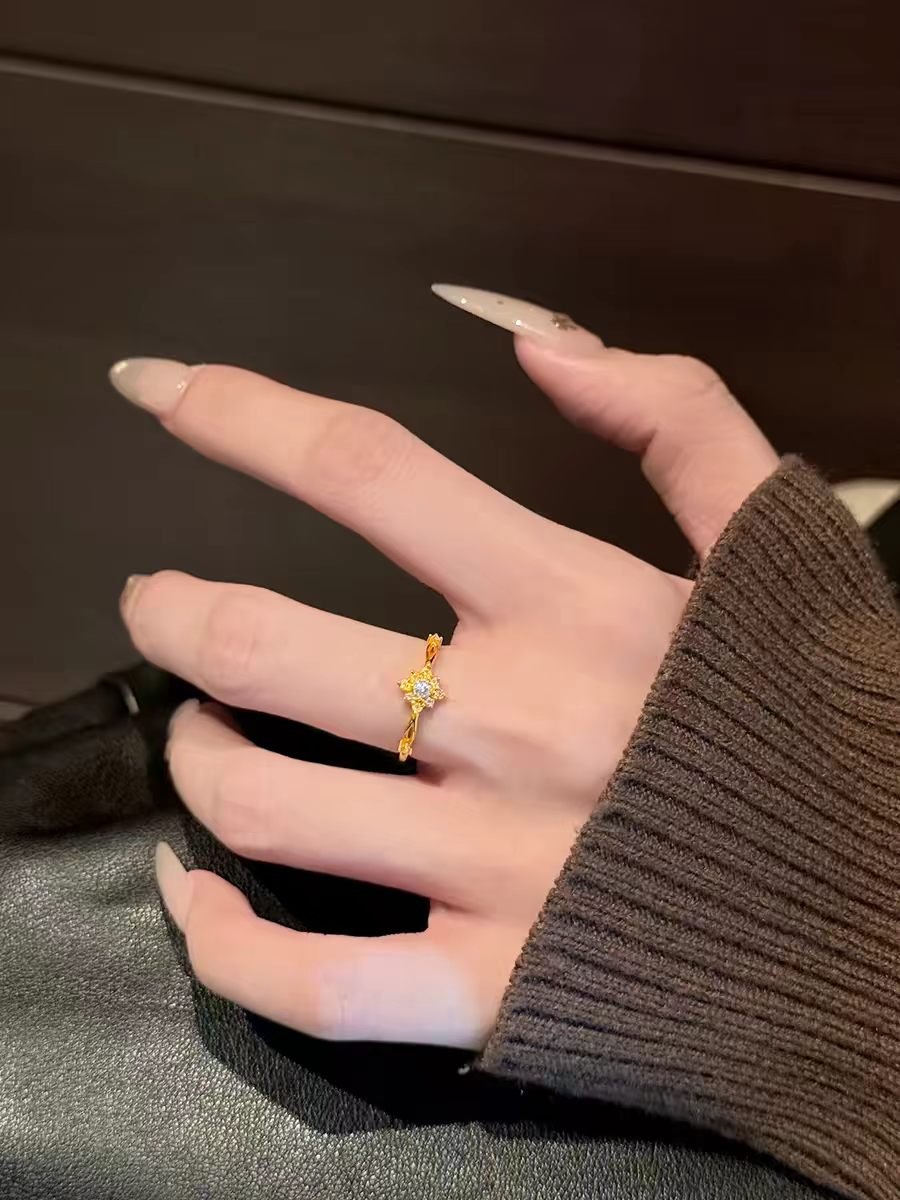 Woman Wearing Sunflower Moissanite Gold Ring