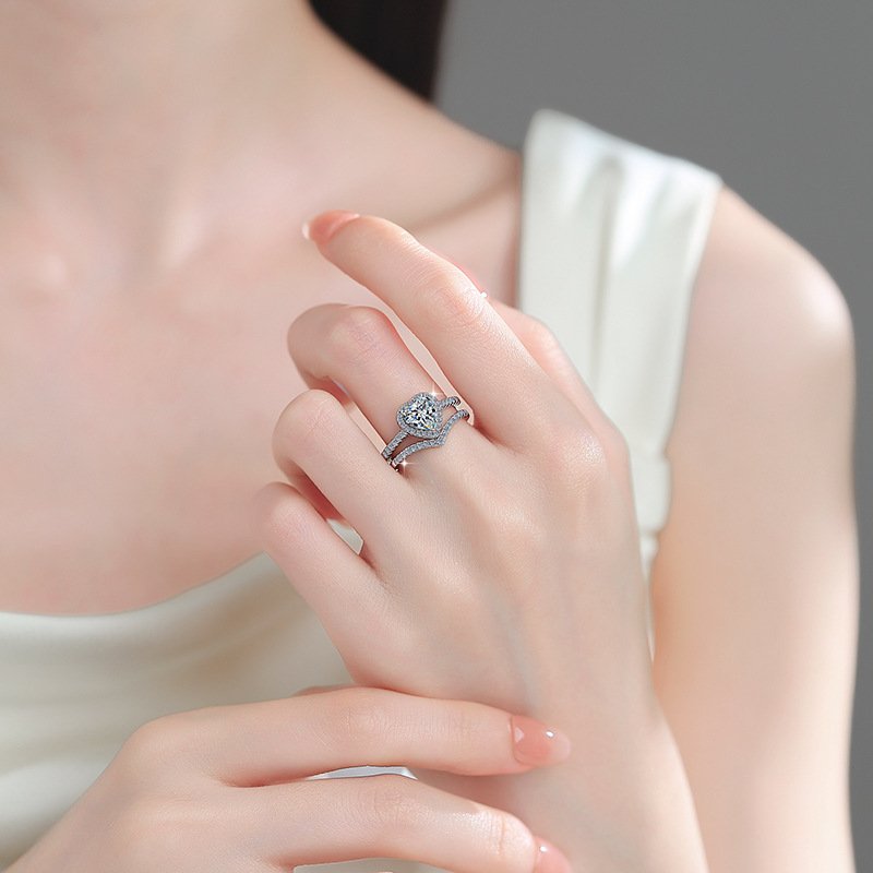 Engraved heart ring inside worn on model hand