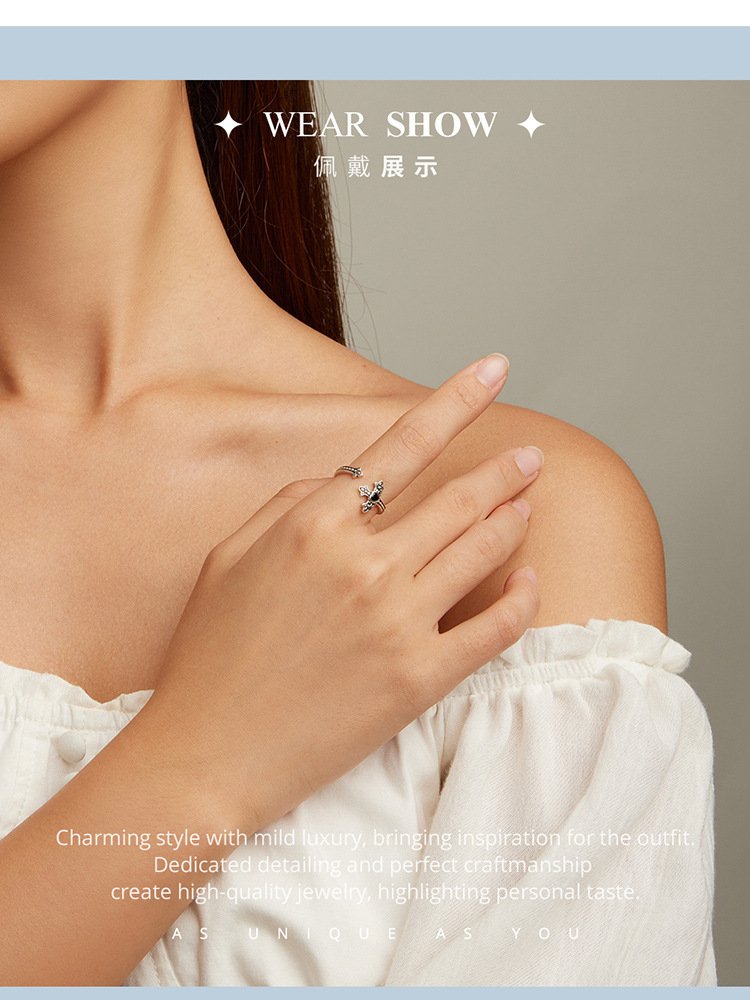 Model wearing black cross heart ring for women, perfect heart ring for girlfriend daily wear