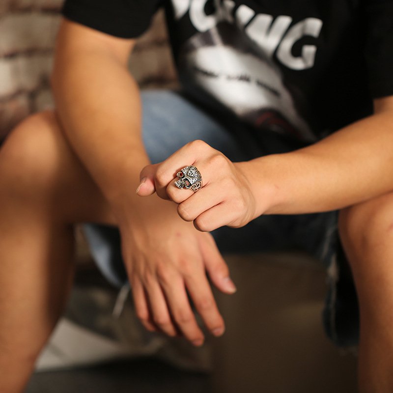 Model wearing vintage heart ring for men, personality skull red corundum mens heart ring