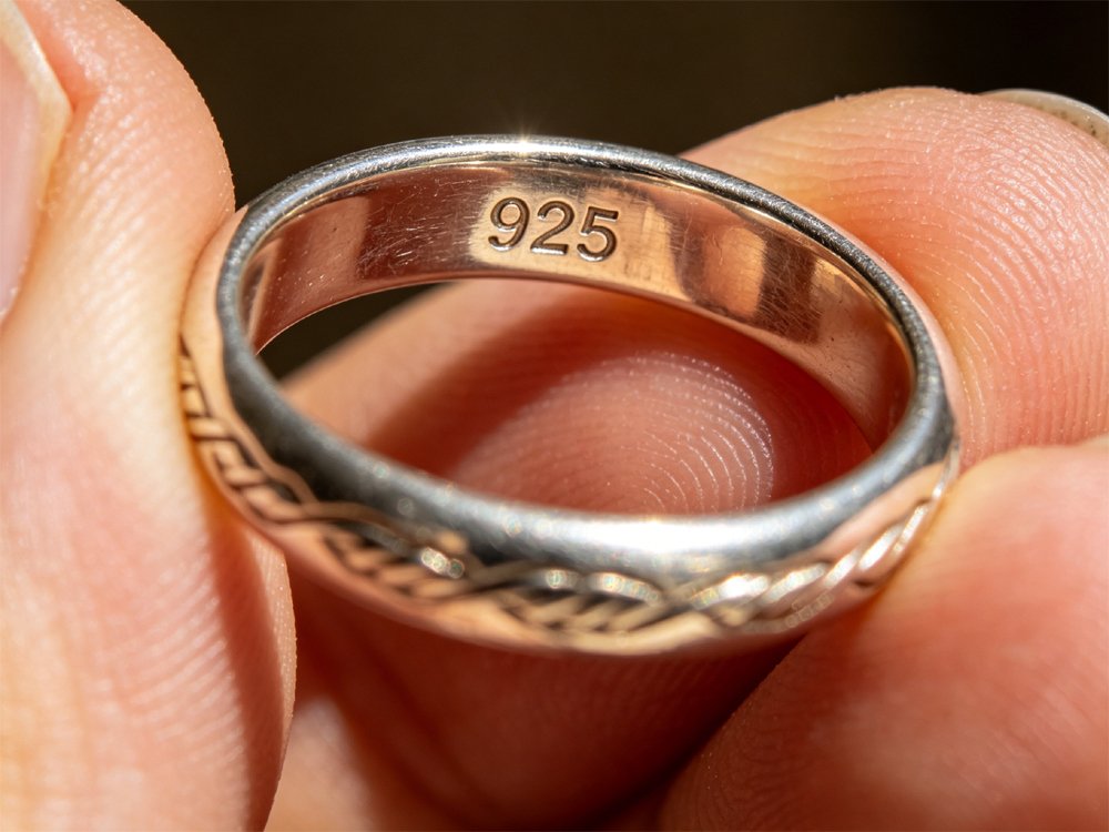 Clear 925 purity hallmark engraved inside authentic sterling silver ring