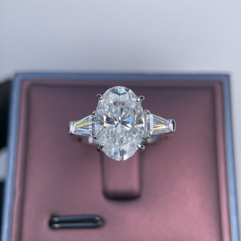 oval cut moissanite engagement ring three stone baguette accents 