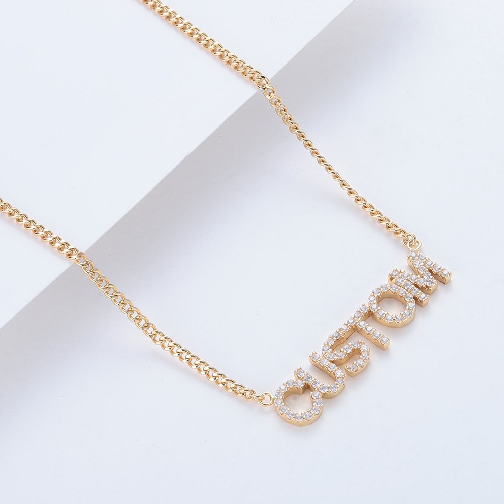 Gold Custom Letter Pendant necklace with zircon stones, hypoallergenic titanium steel design.