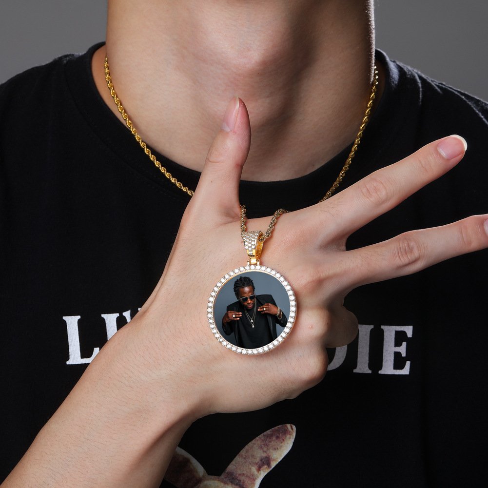 man-wearing-personalized-photo-pendant Man wearing a personalized photo pendant with a twisted rope chain, iced out with CZ stones