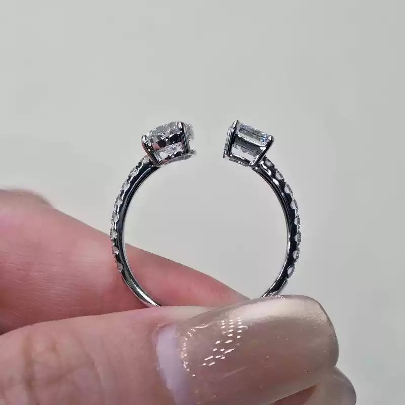 Side view of moi et toi diamond ring, showing half-eternity pavé and adjustable open band