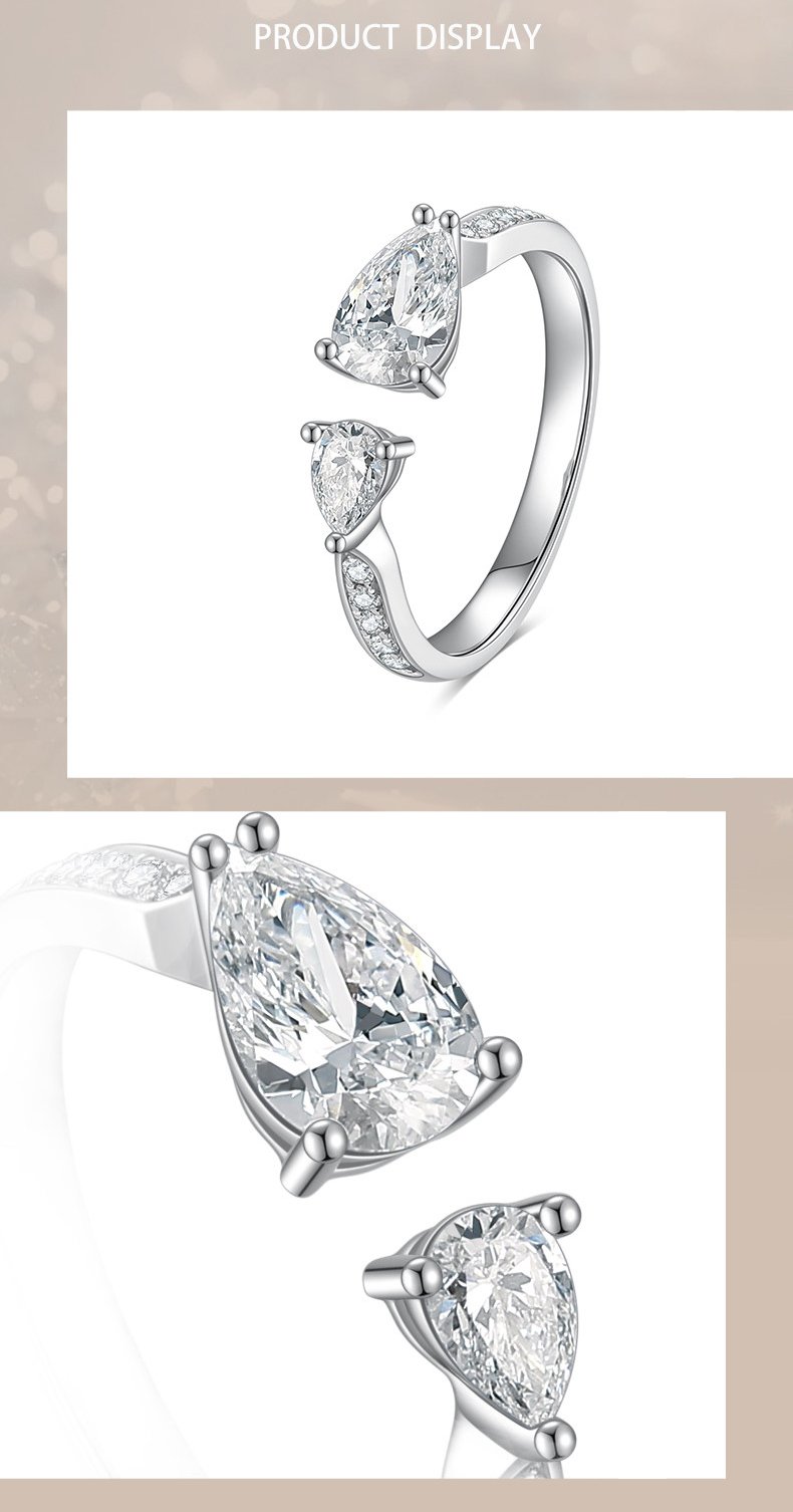 Close-up of engagement ring with two diamond, highlighting prong-set pear-cut lab-grown diamonds