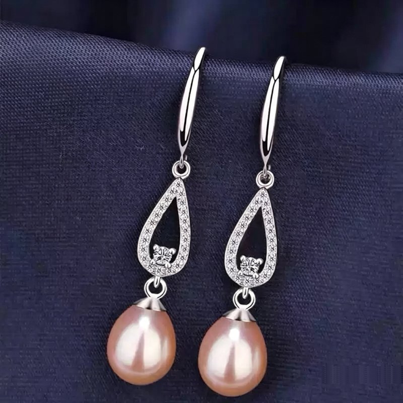 Flat lay of 2026 new white & pink natural freshwater pearl dangle earrings, 8-9mm pearl & 40mm full length with double-layer CZ and S925 silver hooks