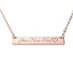 Engraved bar necklace in S925 sterling silver from SYMARA, featuring a horizontal pendant with personalized name engraving.