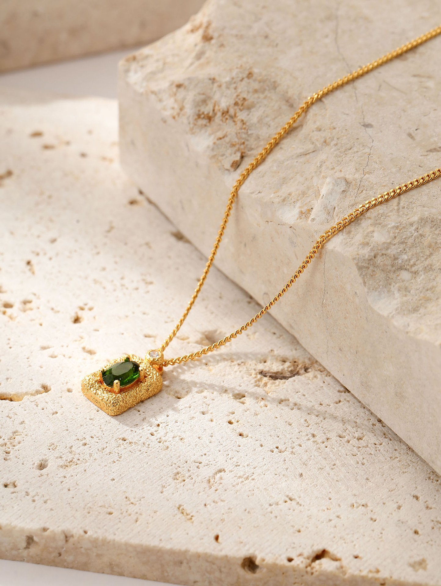 45-degree side view of hammered texture square diopside pendant necklace, 18K gold plated S925 silver everyday luxury jewelry