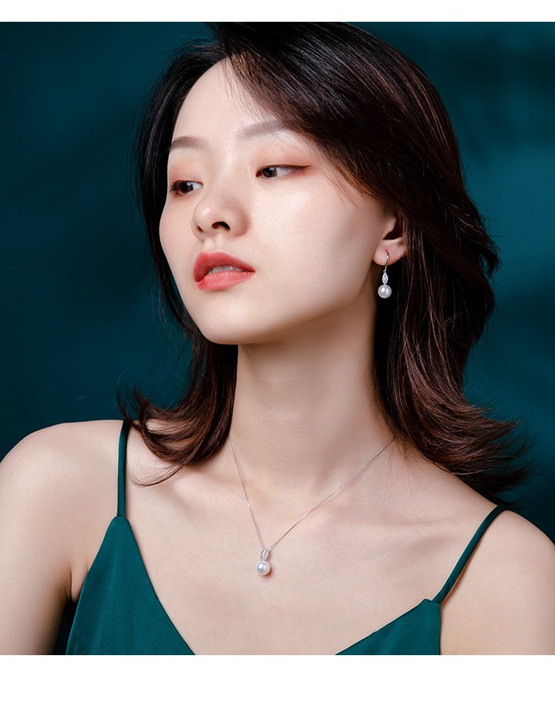 Lady model wearing 8mm freshwater pearl drop earrings for wedding bridal daily office SYMARA