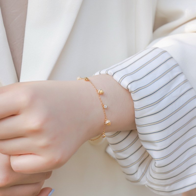 Dainty hazelnut tassel bracelet daily wear look, elegant silver bracelet for women