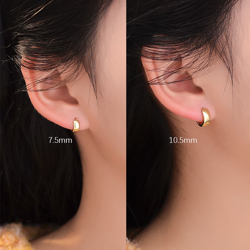 Minimalist daily ear styling of SYMARA plain polished silver huggie hoops, women quiet luxury everyday gift jewelry