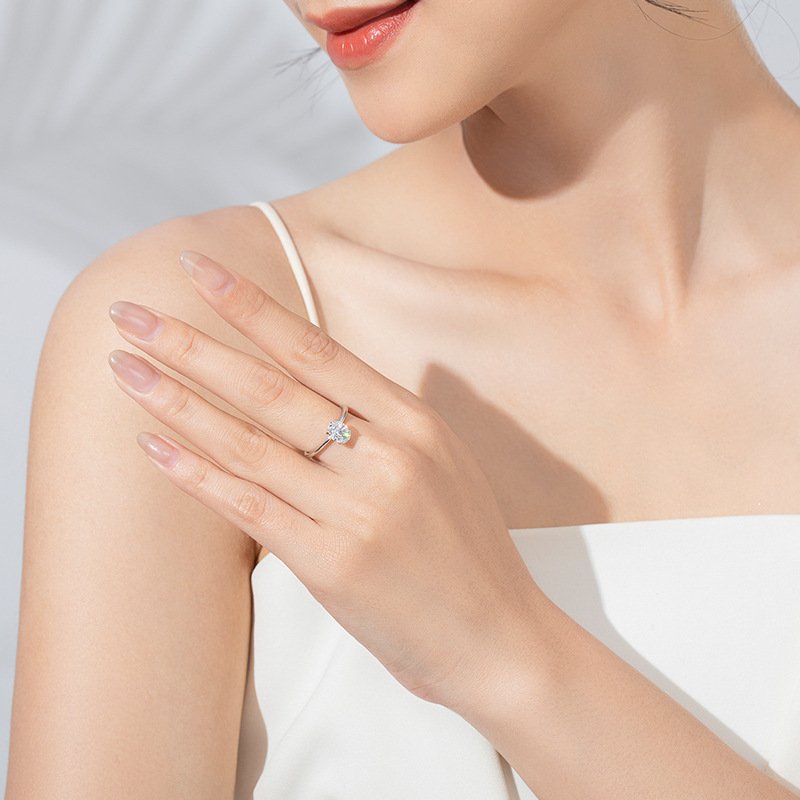 Minimalist oval cubic zirconia engagement ring daily wear look, cool luxury silver ring