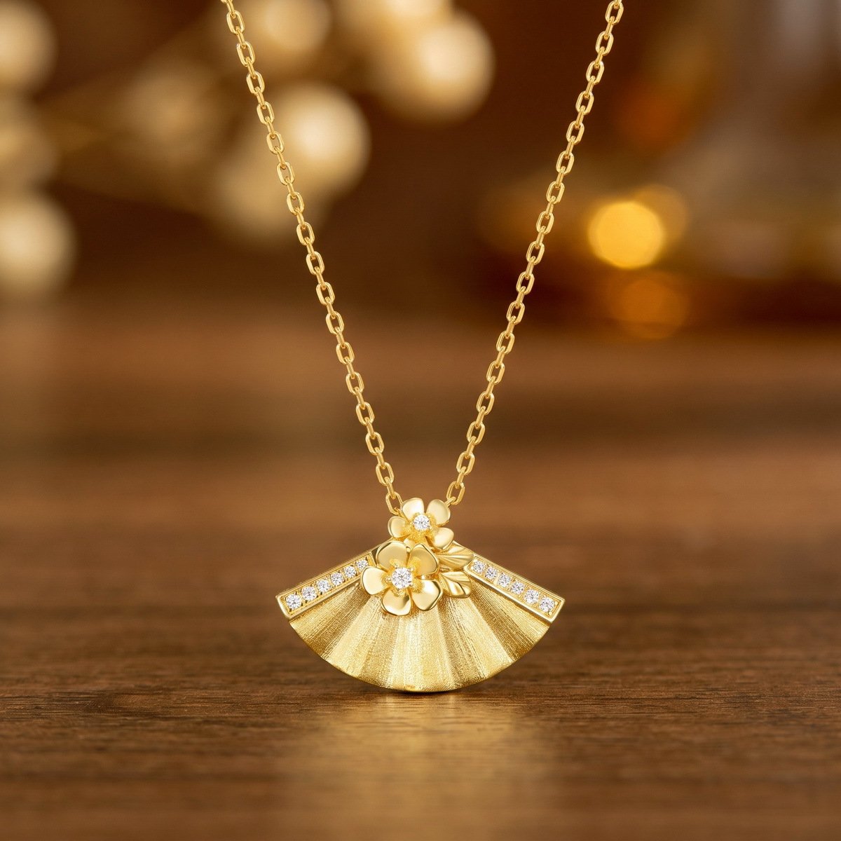 Close‑up of hand‑brushed metal texture on fan‑flower moissanite pendant