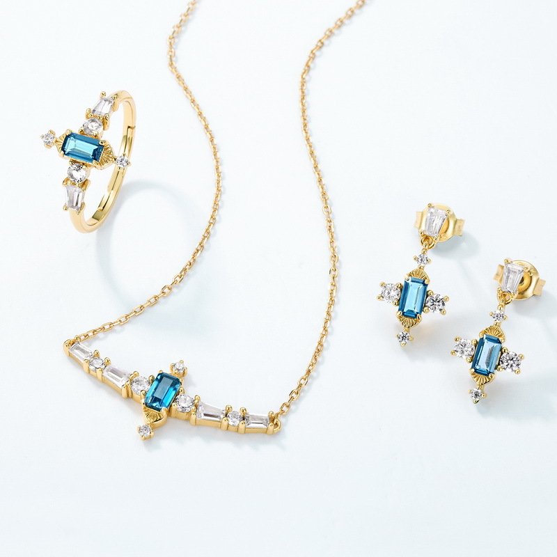 Elegant London blue topaz drop earrings with Art Deco geometric design, hypoallergenic silver November birthstone earrings for formal and daily wear