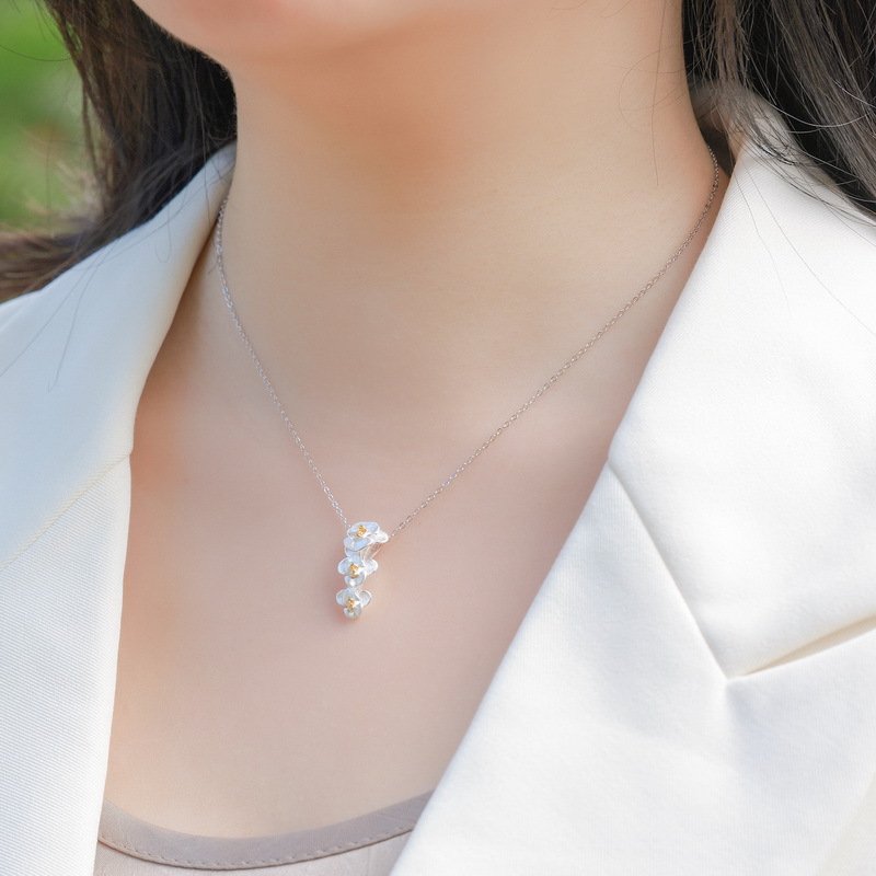 Phalaenopsis orchid necklace styled for everyday and office wear, nature-inspired delicate jewelry