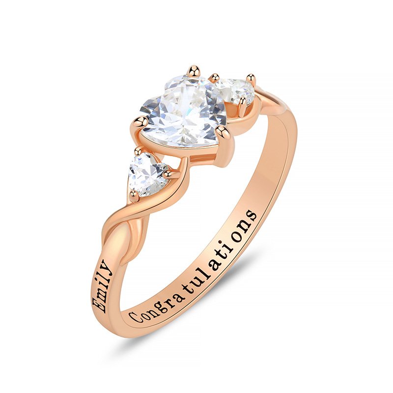 Hand wearing rose gold plated custom heart birthstone graduation memorial ring
