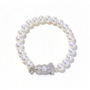 Natural 7‑8mm white Akoya seawater pearl bracelet for women, classic quiet‑luxury pearl jewelry with S925 sterling silver filigree clasp displayed in premium gift box